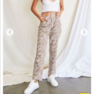 Zebra print straight leg jeans brand new.